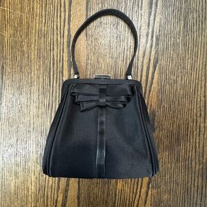 Elegant Black Handbag with Bow Accent